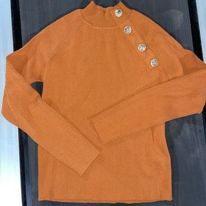 Rust sweater top with shoulder buttons
